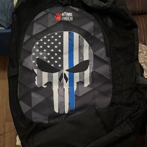 Black Backpack with Skull and Flag Design